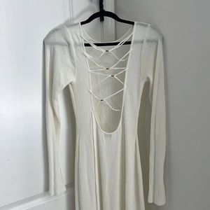 Meshki cream colored long sleeve dress. Open tie back. Size XL